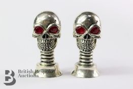 A Pair of Skull Condiments.