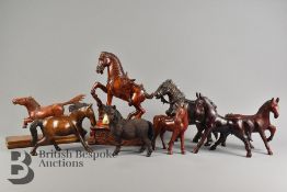 Nine Wood Carved Horses