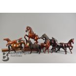 Nine Wood Carved Horses