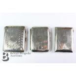 Five Silver Cigarette Cases and Two Lighters