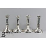 George III Four Silver Candlesticks