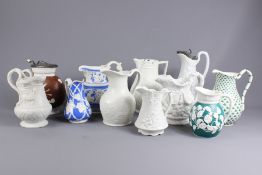 Quantity of 19th and early 20th Century Stoneware Relief Moulded Jugs