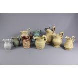 Quantity of 19th and Early 20th Century Stoneware Relief Moulded Jugs