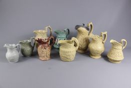 Quantity of 19th and Early 20th Century Stoneware Relief Moulded Jugs