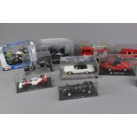 Collection of Boxed Fire Trucks, Mini Series Cars, and 007 Goldfinger Ford Thunderbird