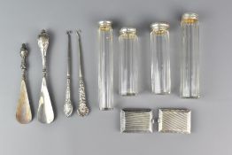 Four Cut-Glass Vanity Bottles