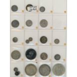 Silver coins on album page incl.