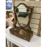 A VICTORIAN SHIELD GLASS SWING TOILET MIRROR WITH VICTORIAN IVORY ESCUTEONS AND HANDLES IN