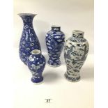 FOUR BLUE AND WHITE CHINESE PORCELAIN VASES, TWO OF WHICH DEPICTING A DRAGON CHASING THE FLAMING