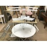 A WHITE METAL FOLDING TABLE WITH 4 WHITE WHITE METAL FOLDING CHAIRS 96 CMS DIAMETER