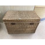 A VINTAGE FRENCH WICKER BASKET