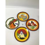 GROUP OF FOUR LIMITED EDITION BONE CHINA 'THE BIZARRE WORLD OF CLARICE CLIFF' PLATES BY WEDGWOOD FOR