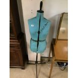 A VINTAGE CHILL D'OR DRESSMAKERS DUMMY ON A METAL STAND