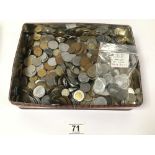 A TIN OF CIRCULATED COINAGE FROM AROUND THE WORLD