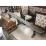 AN OAK VINTAGE BENCH 262 CM