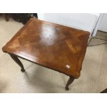 A VINTAGE EXTENDING FRENCH DINING TABLE