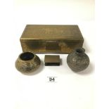 FOUR BRASS ITEMS INCLUDING A 1917 MATCHBOX HOLDER AND THREE INDIAN BRASS ITEMS