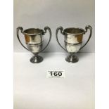 A PAIR OF SMALL SILVER TWO HANDLED TROPHIES, HALLMARKED 1923 BY H PHILIPS, 116G