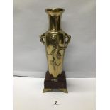 A BRONZE VASE ON A MARBLE BASE HEIGHT 37 CMS