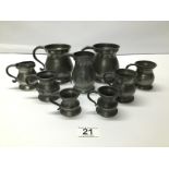 A GRADUATED SET OF PEWTER JUGS
