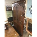 A LARGE FRENCH OAK HALL COAT/UMBRELLA STAND 215 X 145 CM