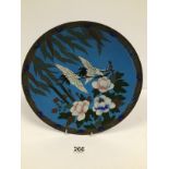 A 19TH CENTURY JAPANESE CLOISONNE ENAMEL WALL PLATE OF CIRCULAR FORM DECORATED WITH SCENES OF TWO