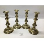 SET OF FOUR EARLY 19TH CENTURY BRASS BALUSTER CANDLESTICKS 18 CMS