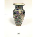 A JAPANESE PORCELAIN VASE OF BALUSTER FORM, DECORATED THROUGHOUT WITH POLY CHROME ENAMELS, CHARACTER