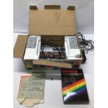 A VINTAGE BOXED ACETRONIC VIDEO SYSTEM WITH A SUPERSTAR BOXED GAME