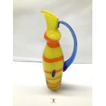A LARGE ORREFORS GLASS JUG BY HELEN KRANTZ YELLOW BLUE AND ORANGE HEIGHT 39 CMS
