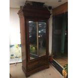 A WALNUT FRENCH ARMOIRE WITH MIRRORED FRONT