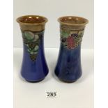 A PAIR OF ROYAL DOULTON VASES WITH TUBE LINED DECORATION OF FRUIT AND LEAVES, MARK TO BASE '