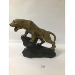 A LARGE POTTERY SCULPTURE OF A GOLDEN TIGER SIGNED P BALESTRA