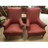 A PAIR OF EARLY FRENCH ARM CHAIRS ON ORIGINAL CASTORS