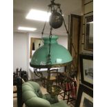 A VINTAGE GLASS AND BRASS HANGING LIGHT
