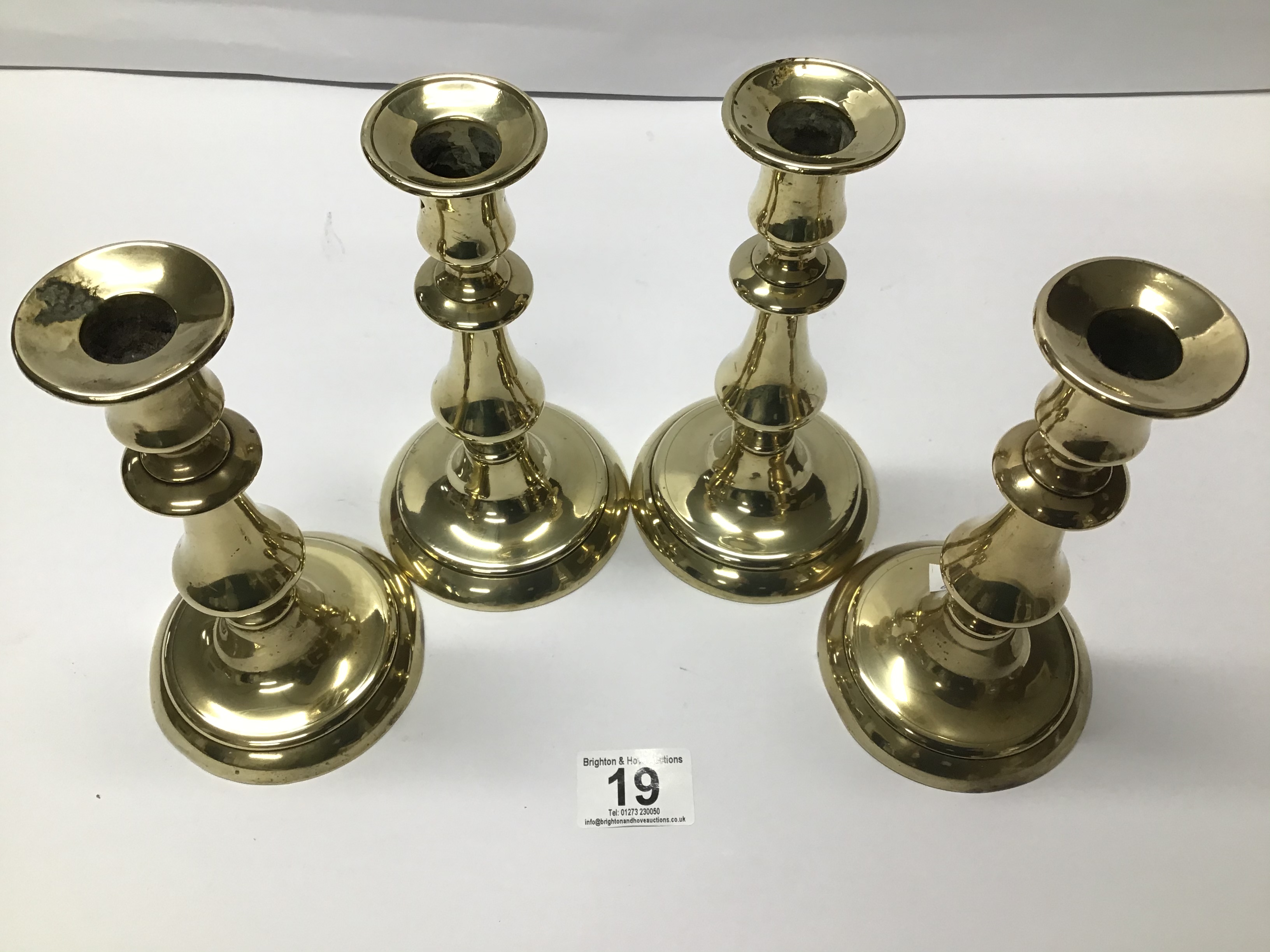 SET OF FOUR EARLY 19TH CENTURY BRASS BALUSTER CANDLESTICKS 18 CMS - Image 2 of 2