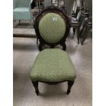 A ROSEWOOD UPHOLSTERED BEDROOM CHAIR ON ORIGINAL CASTORS