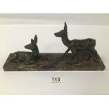 A PIECE OF GARNITURE TWO SPELTER DEERS ON A MARBLE BASE 35 CMS LONG