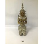 A MIDDLE EASTERN GILT BRONZE FIGURE OF A PRAYING DEITY POSSIBLY HINDU WITH SILVERED DETAILING