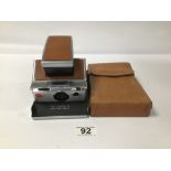 A POLAROID SX-70 LAND CAMERA IN ORIGINAL CASE