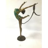 A MODERN BRONZE FIGURE OF A DANCING GIRL WITH A RIBBON WITH PAINTED DETAIL THROUGHOUT 48 CMS