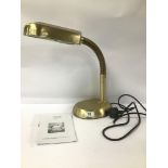 A DAYLIGHT BRASS ANGLEPOISE TABLE LAMP