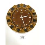 A RETRO HONITON POTTERY BROWN GLAZED WALL CLOCK FOR METAMEC, 22.5CM DIAMETER