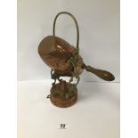 A 20TH CENTURY FRENCH ORNATE BRASS HOT CHOCOLATE POT WITH WOODEN HANDLE AND OIL HEATER, ON STAND,