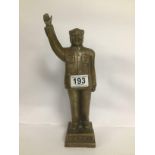 A CHINESE BRASS FIGURE OF CHAIRMAN MAO WITH HIS RIGHT HAND ALOFT, FIVE CHARACTER MARKS TO THE FRONT,