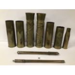 A COLLECTION OF MILITARY BRASS SHELL CASES, SOME WITH TRENCH ART DECORATION, LARGEST 35CM HIGH,