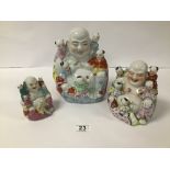 THREE CHINESE CERAMIC FIGURES OF BUDDHA'S WITH CHILDREN PLAYING ON THEM, LARGEST 20CM HIGH