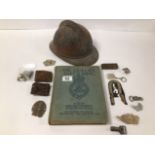 A MIXED GROUP OF ITEMS, COMPRISING A WWI FRENCH ARTILLERY HELMET, ASSORTED METAL DETECTING FINDS,