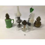 FOUR VINTAGE OIL LAMPS OF DIFFERENT MATERIALS, LARGEST 32CM HIGH