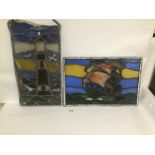 TWO LEAD LINED STAINED GLASS PANELS, ONE DEPICTING A BOAT, THE OTHER A LIGHTHOUSE, 54.5CM WIDE, BOTH